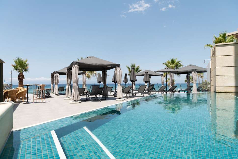 Ein Foto vom Pool im Aquila Porto Rethymnon