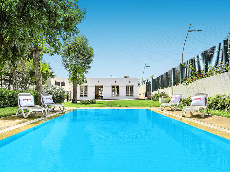 Een foto van het zwembad bij Allegro Agadir
