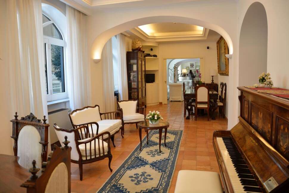 Een foto van het interieur van Hotel Villa Romana