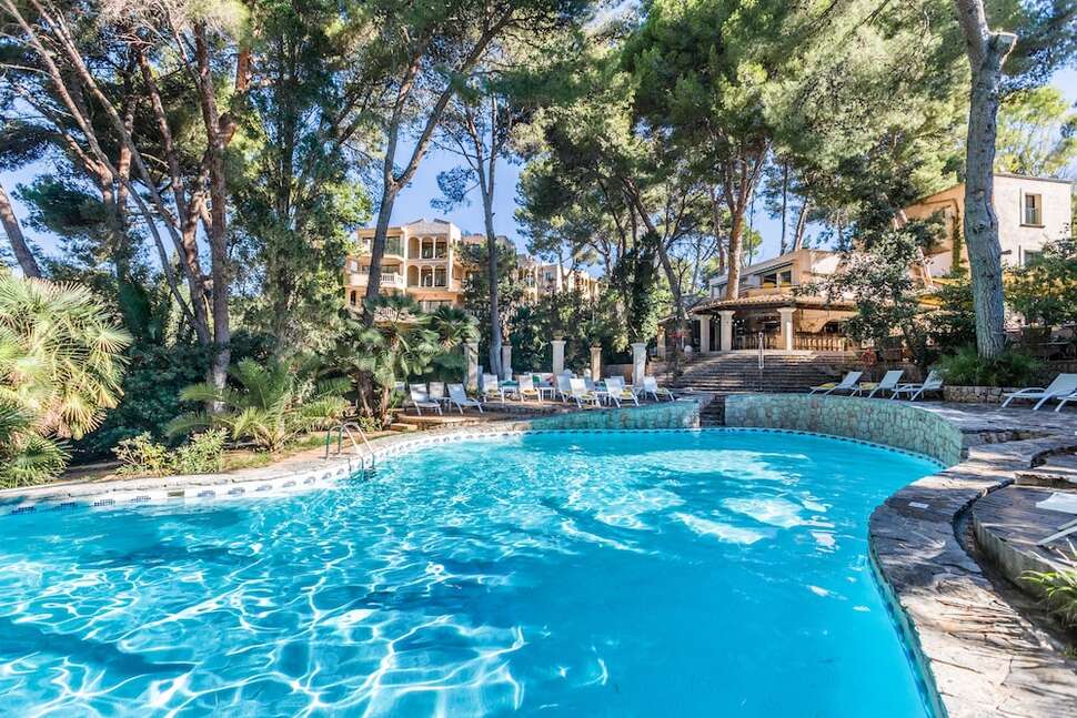 Een foto van het zwembad bij Hotel Lago Garden Suites & Spa