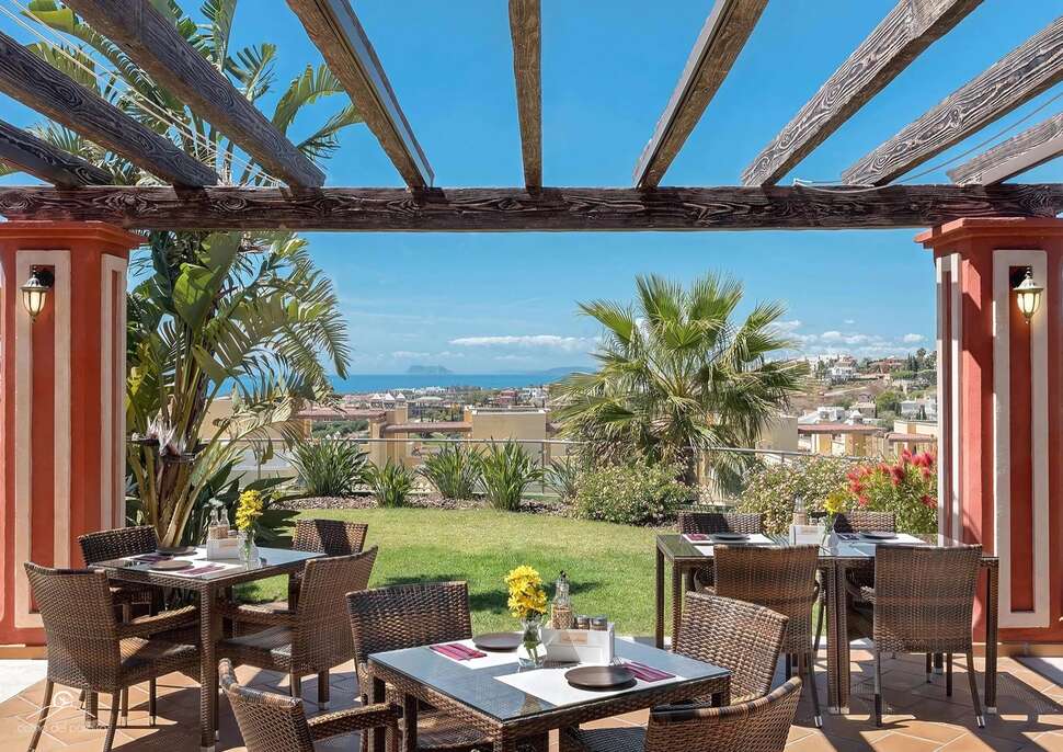 Een foto van het terras bij Colina del Paraiso