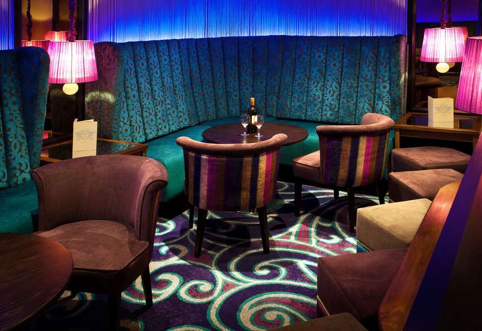 Een foto van het interieur van Strand Palace Hotel