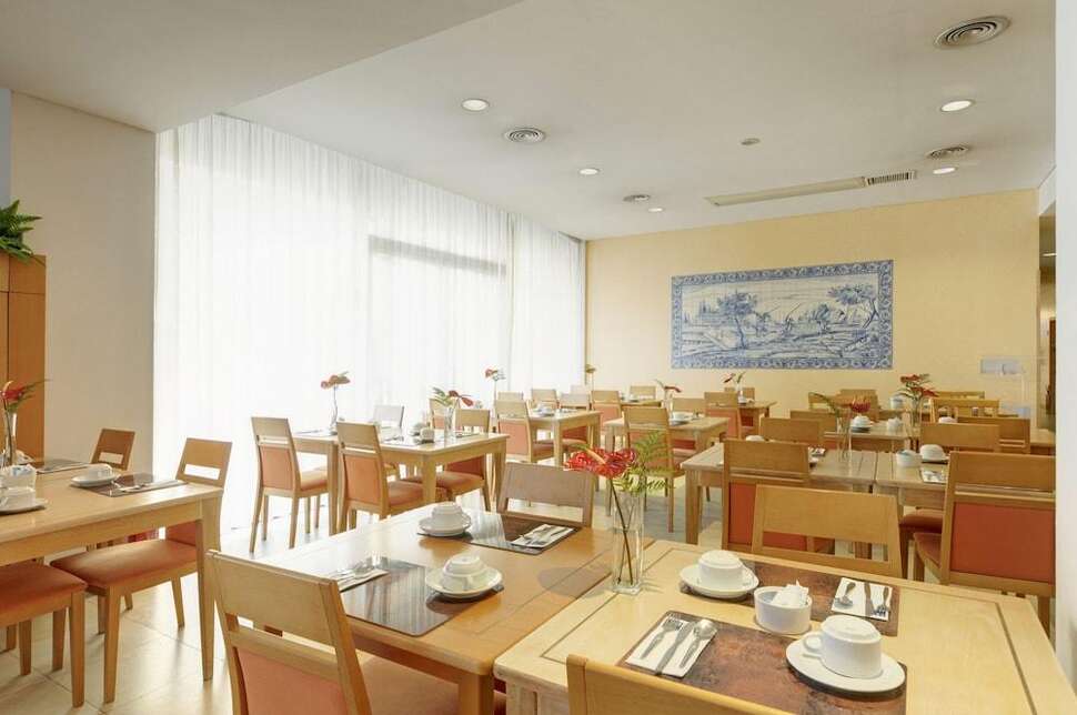 Een foto van de faciliteiten bij Tryp by Wyndham Porto Centro Hotel