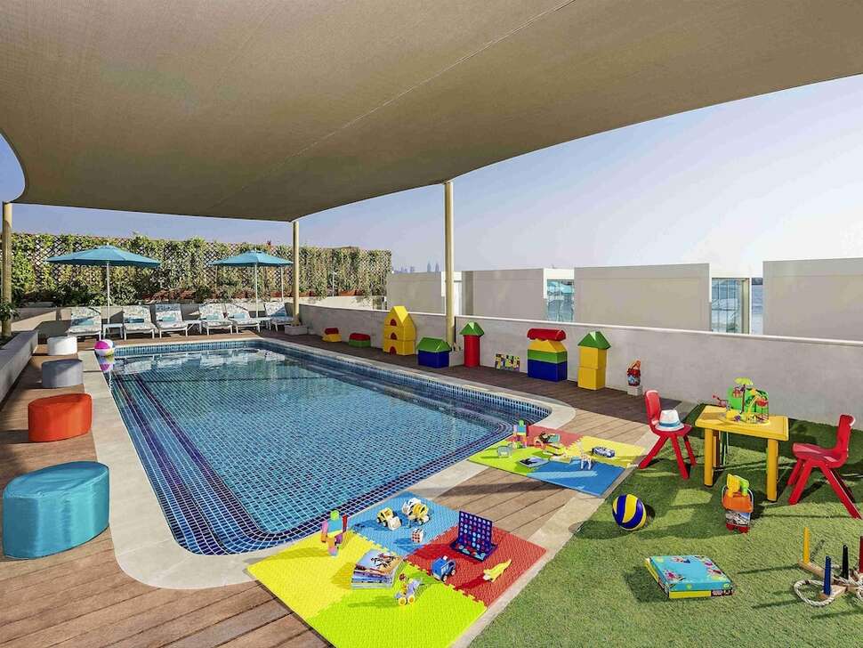 Ein Foto vom Pool im The Retreat Palm Dubai - MGallery by Sofitel