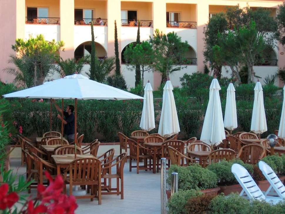 Een foto van het terras bij Residence Club Odalys Sognu di Mare