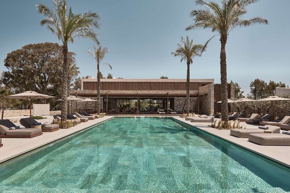 Een foto van het zwembad bij Theros All Suite Hotel