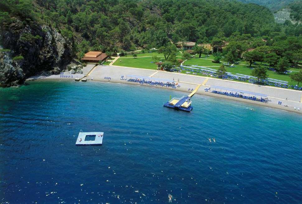 Een foto van het strand bij Robinson Club Camyuva