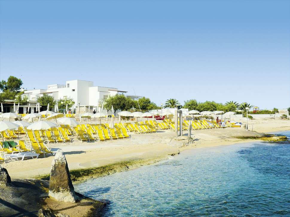 Een foto van het strand bij Hotel Riva del Sole