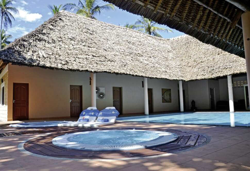 Een foto van het zwembad bij Neptune Village Beach Resort & Spa