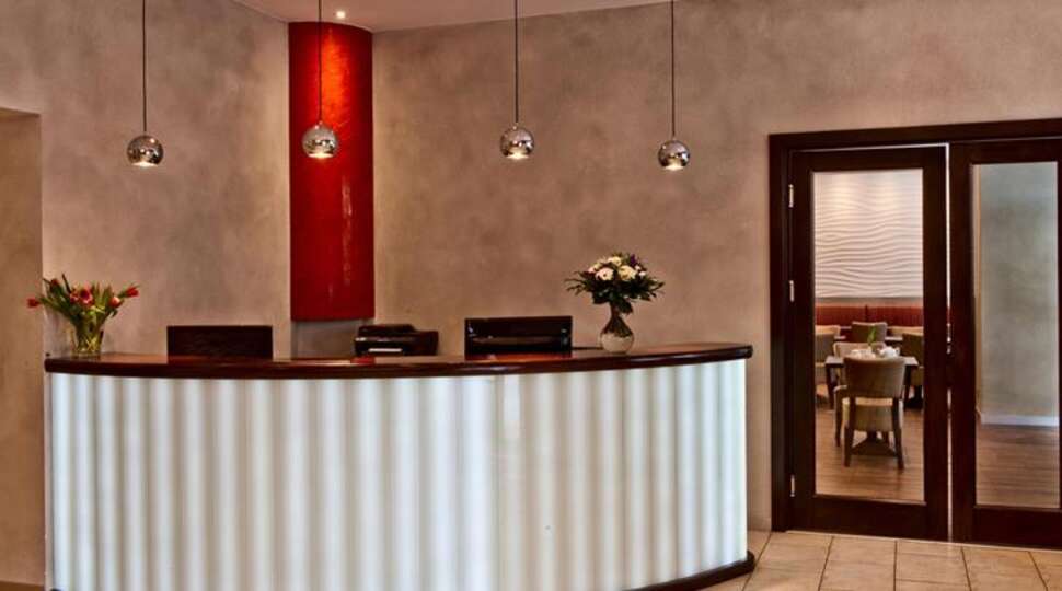 Een foto van het interieur van Hotel Artim