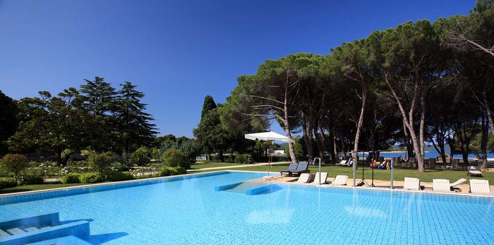 Een foto van het zwembad bij Falkensteiner Hotel Adriana
