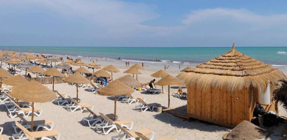 Een foto van het strand bij Jardins de Toumana