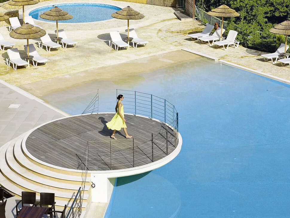 Een foto van het zwembad bij Ariti Grand Hotel