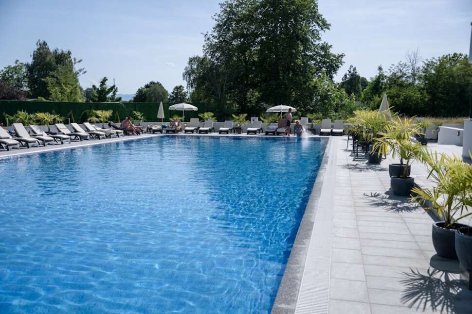 Een foto van het zwembad bij Unique Resort & Spa