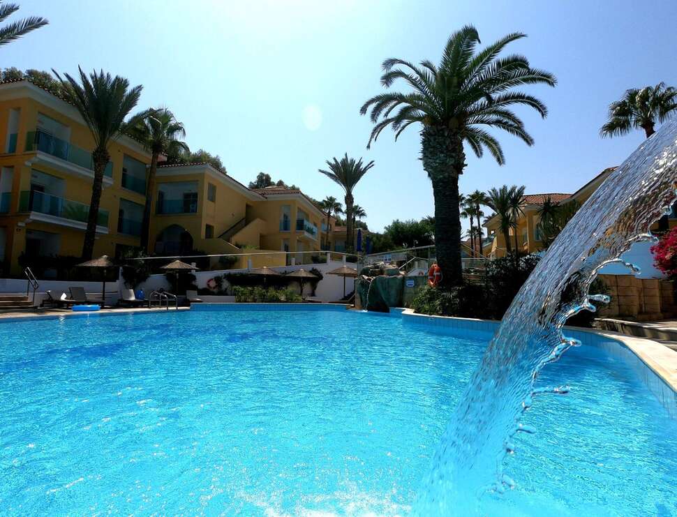 Ein Foto vom Pool im Malama Beach Holiday Village
