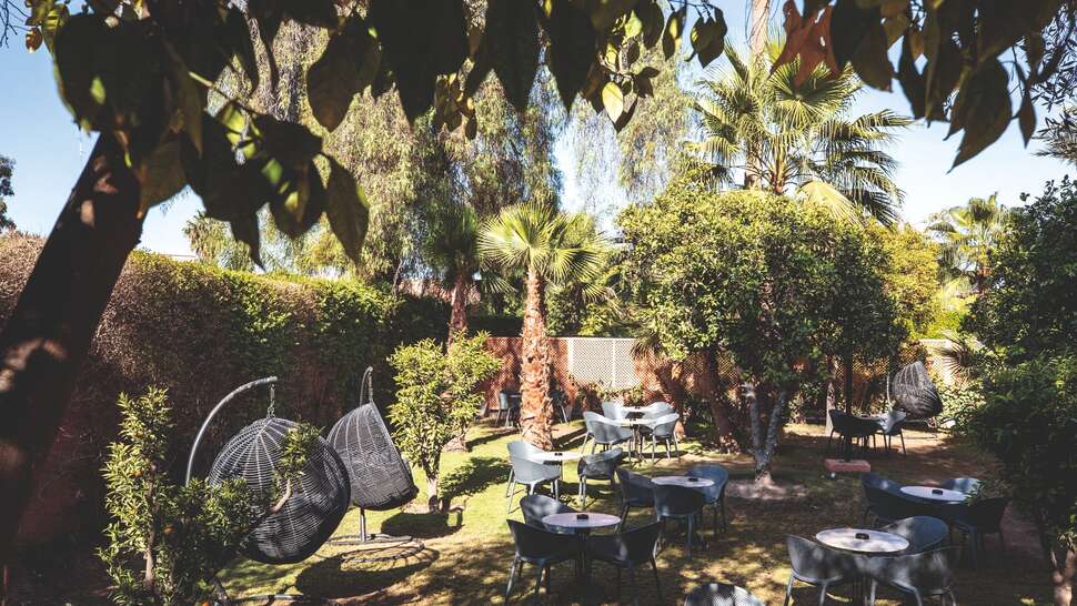 Een foto van het terras bij Medina Gardens