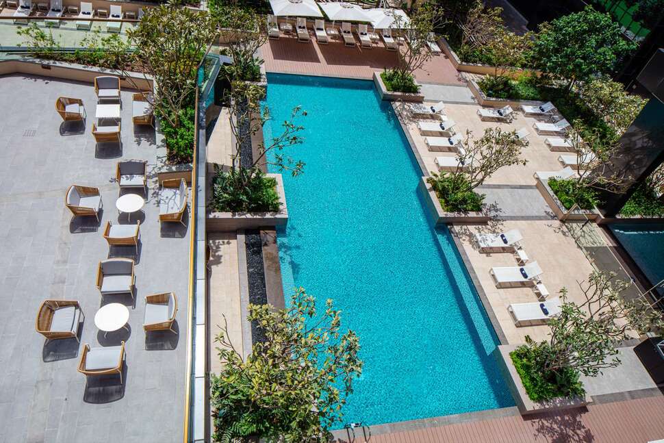 Ein Foto vom Pool im DoubleTree by Hilton Dubai M Square Hotel & Residences