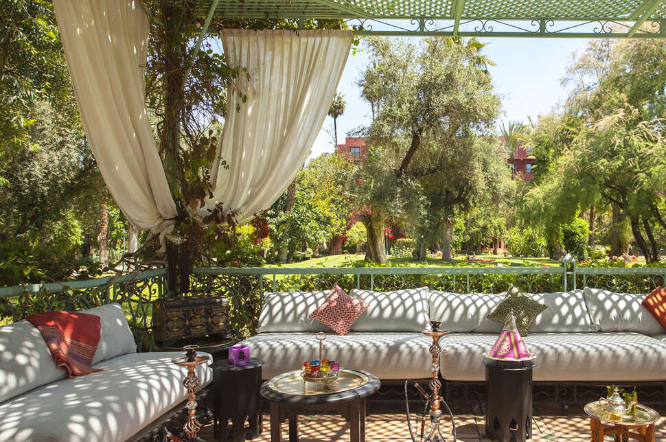 Een foto van het terras bij Kenzi Rose Garden