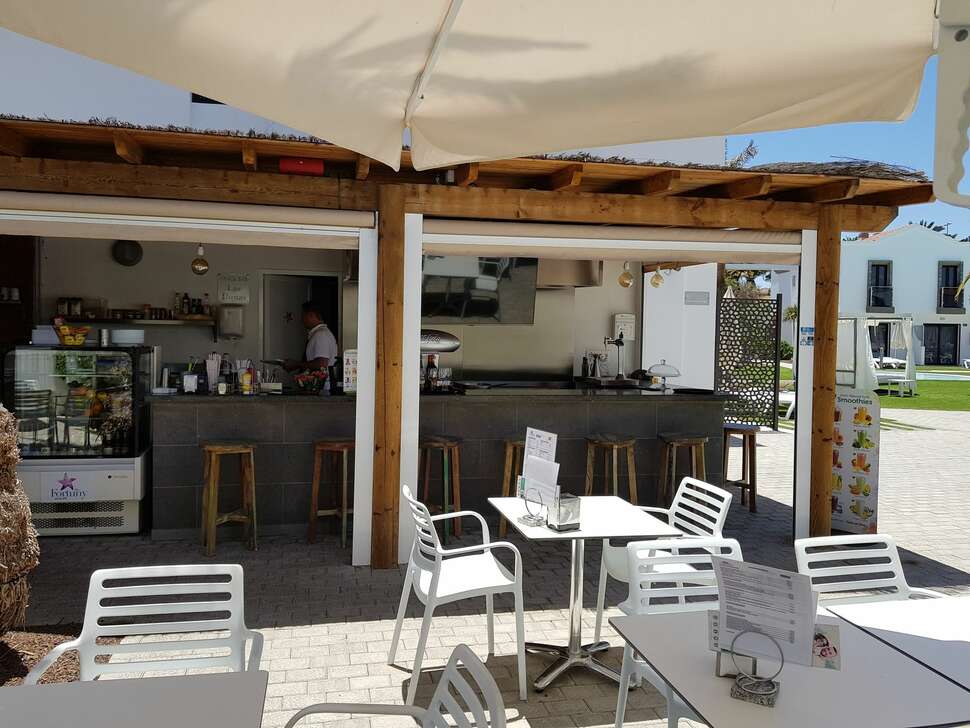 Een foto van het terras bij FBC Fortuny Resort