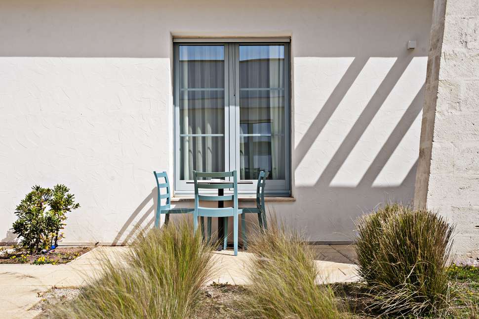 Een foto van de buitenkant van Relais Masseria Le Cesine