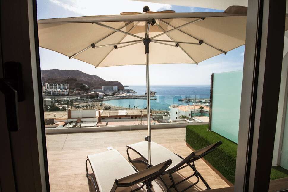 Een foto van het terras bij IG Nachosol Premium Appartementen