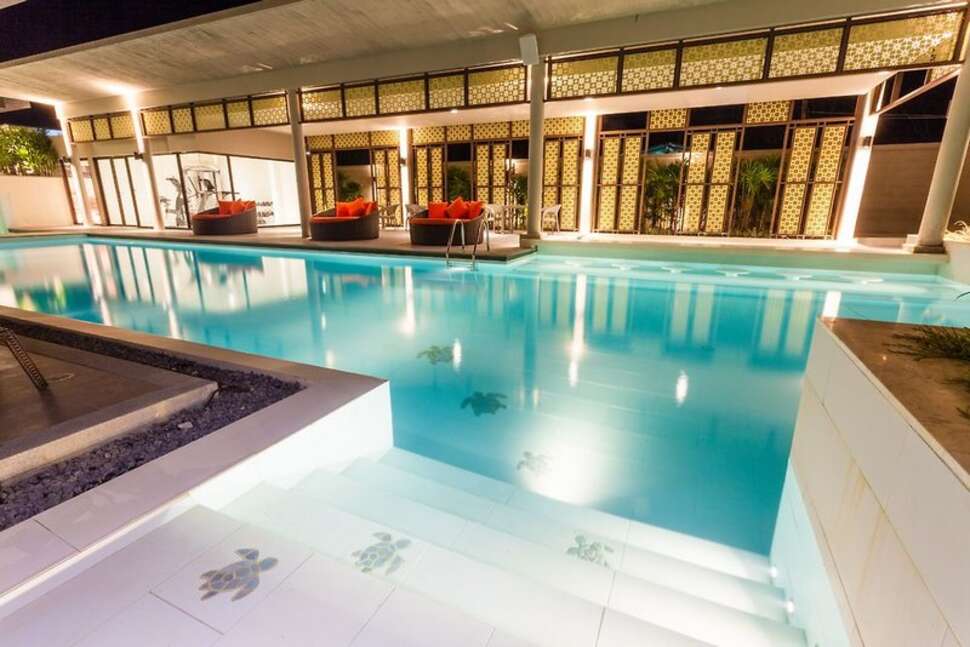 Een foto van het zwembad bij Proud Phuket Hotel