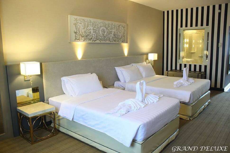 Ein Foto Royal Benja Hotel