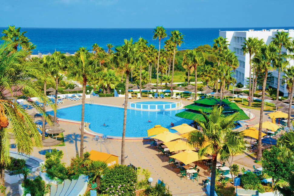 Een foto van het zwembad bij Hotel Club Tropicana & Spa