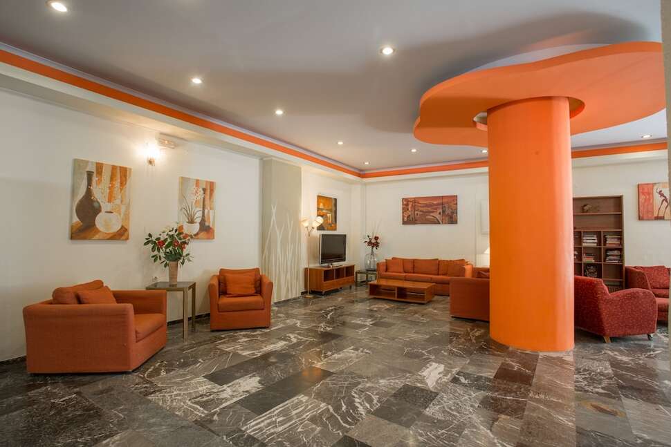 Een foto van het interieur van Popi Star Hotel