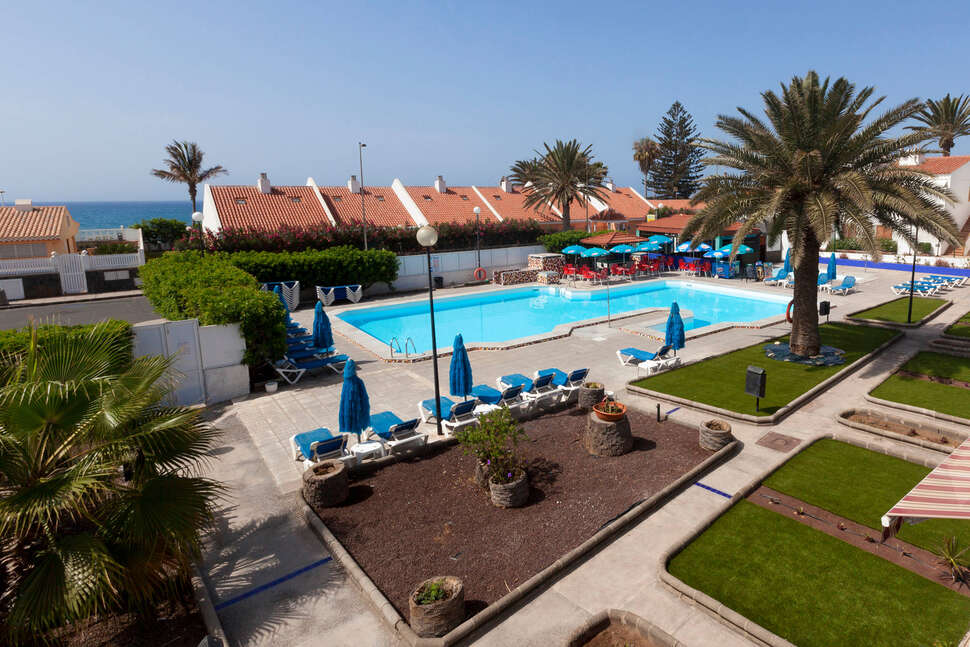 Een foto van het zwembad bij Bungalows Corinto II
