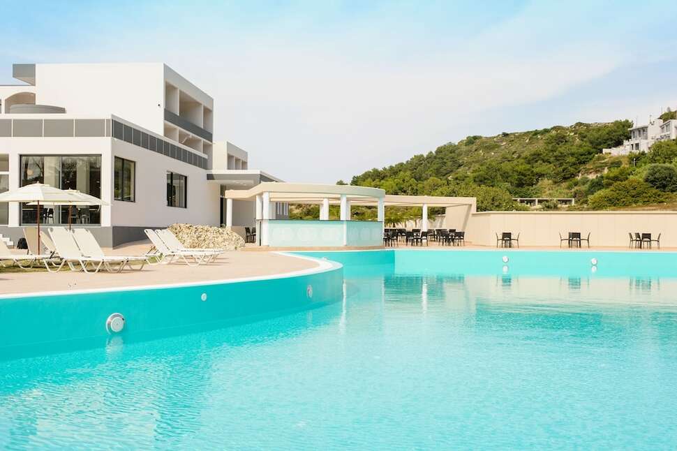 Een foto van het zwembad bij Evita Resort