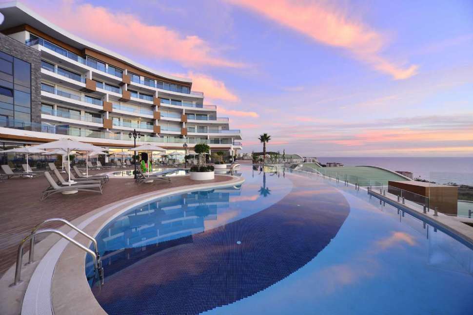 Ein Foto vom Pool im Elite Luxury Suite & Spa
