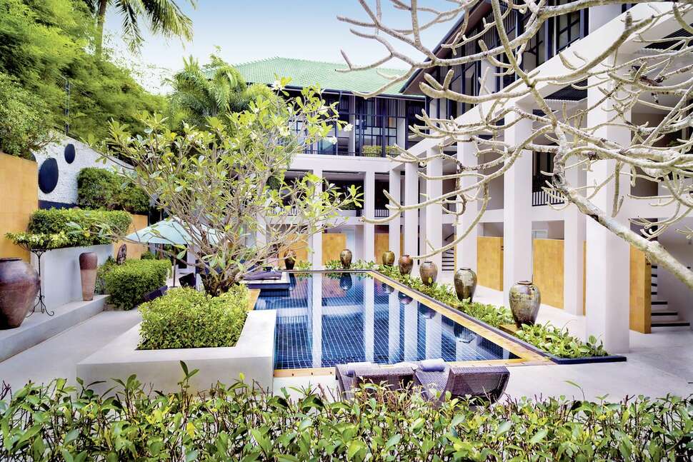 Ein Foto Outrigger Surin Beach Resort