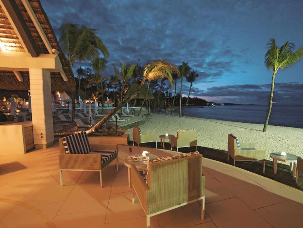 Een foto van het terras bij Ambre Resort & Spa