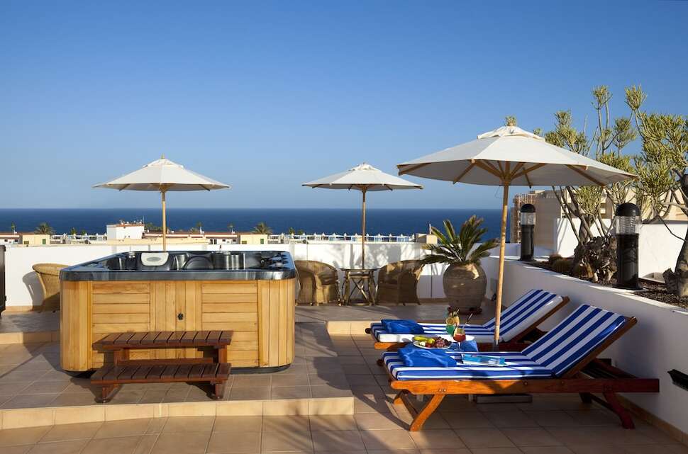 Een foto van het terras bij Seaside Sandy Beach