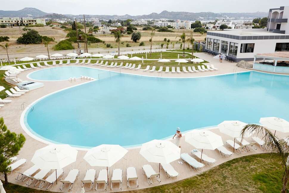 Een foto van het zwembad bij Evita Resort