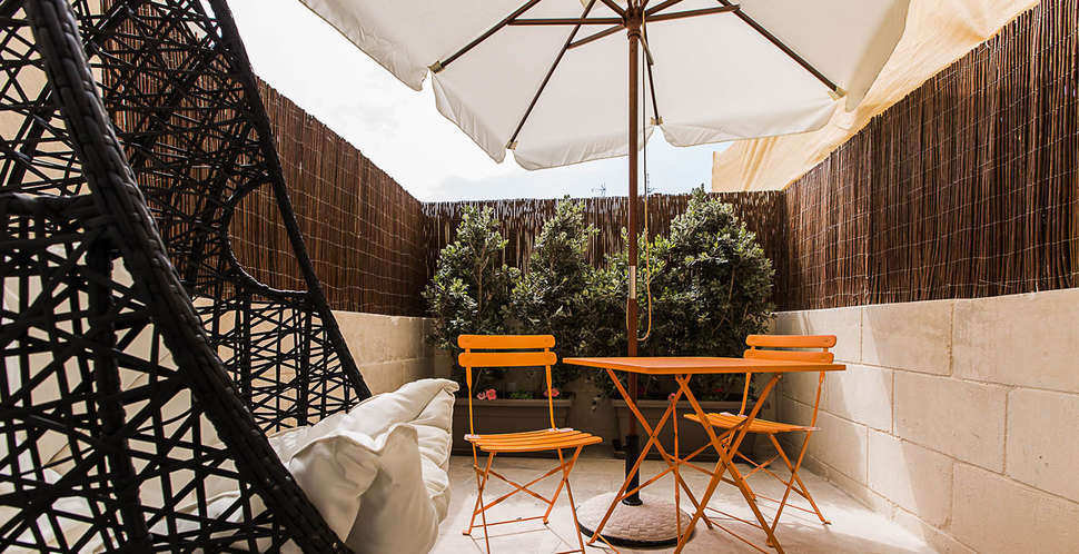 Een foto van het terras bij Murella Living