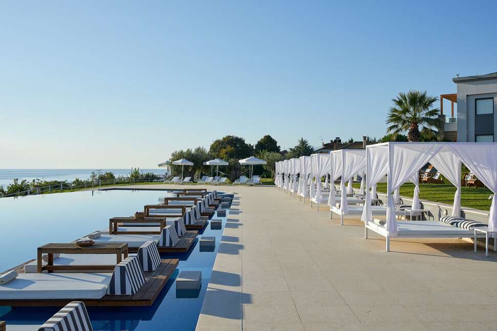 Een foto van het zwembad bij Cavo Olympo Luxury Hotel & Spa