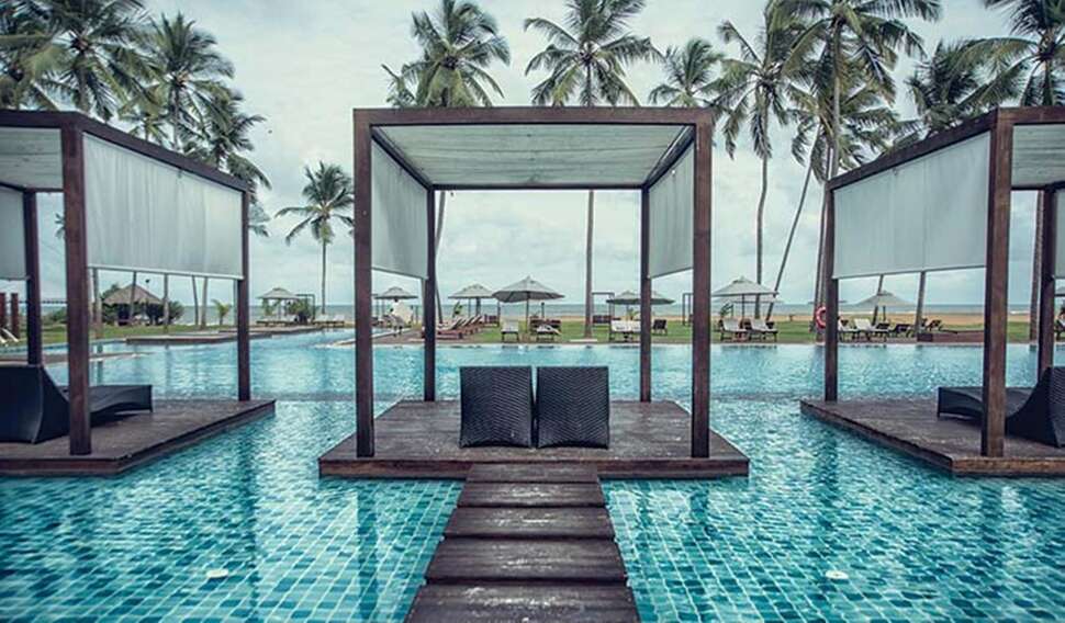 Een foto van het zwembad bij Suriya Luxury Resort