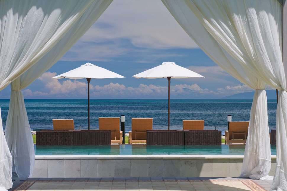 Een foto van het zwembad bij Bali Garden Beach Resort