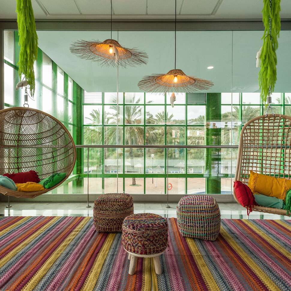 Een foto van het interieur van Holiday World Riwo Hotel