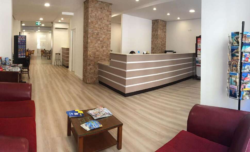 Een foto van het interieur van Elite Hotel Palermo