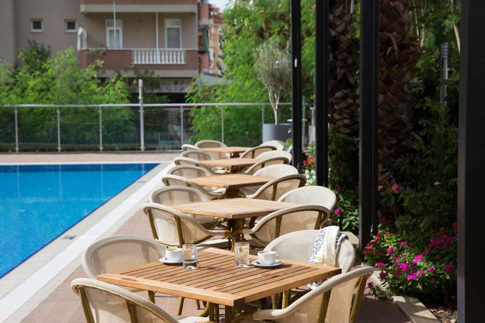 Een foto van het terras bij Vega Green Aparthotel