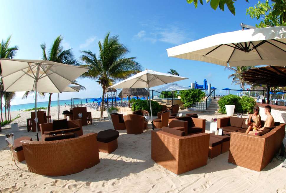Een foto van het strand bij The Reef Playacar Resort
