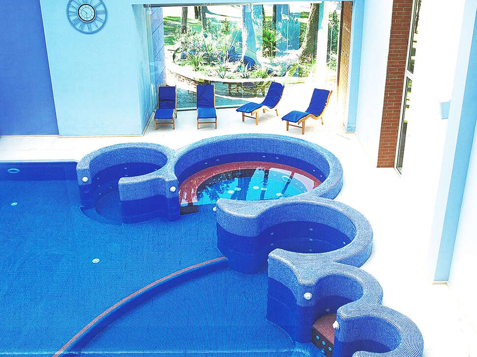 Ein Foto vom Pool im TH Tirrenia Green Park Resort