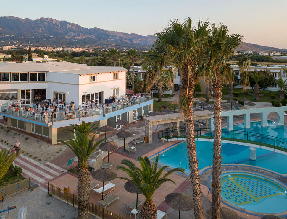 Een foto van het zwembad bij Corali Hotel & Village