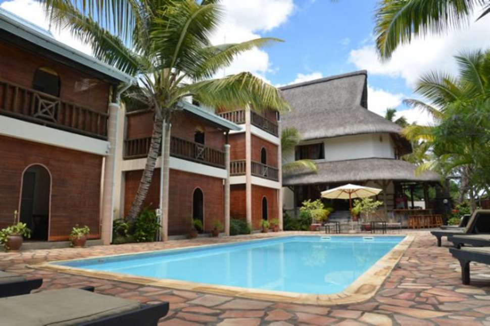 Een foto van het zwembad bij Le Palmiste Resort & Spa