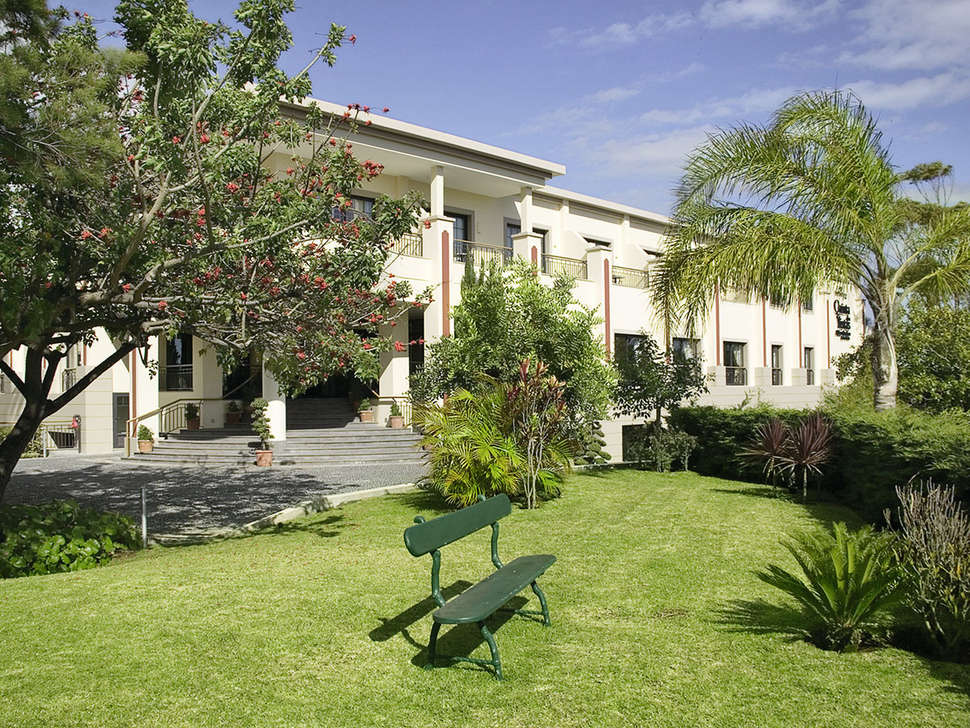 Ein Foto von der Außenansicht des Quinta Funchal Palace Gardens