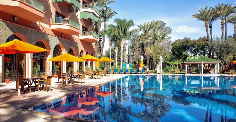 Een foto van het zwembad bij Royal Mirage Deluxe Hotel