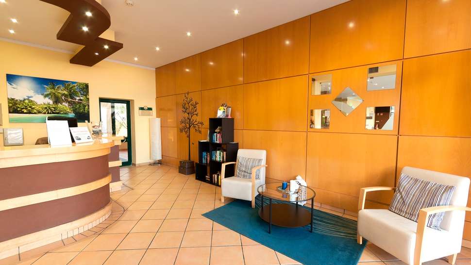 Een foto van het interieur van Plaza Real Aparthotel